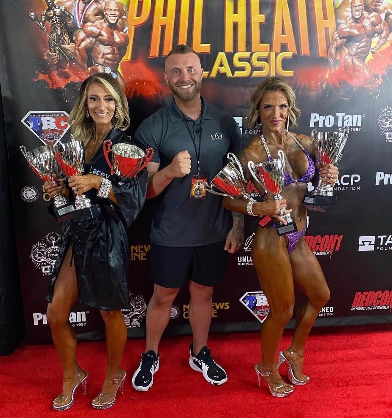 Casey Barnette with two CaseyTrain competitors holding trophies at the 2022 Phil Heath Classic